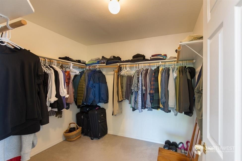 41 Onyx Lane Sequim, WA 98382 - Photo 24 of 40 a view of walk in closet with clothes and shoes
