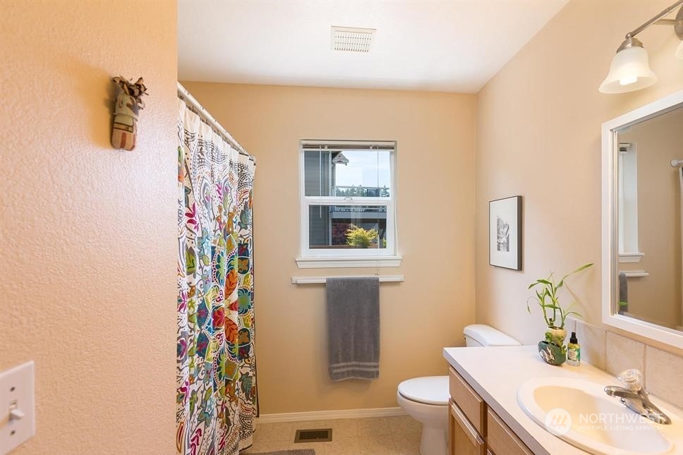 41 Onyx Lane Sequim, WA 98382 - Photo 29 of 40 a bathroom with a sink toilet and shower