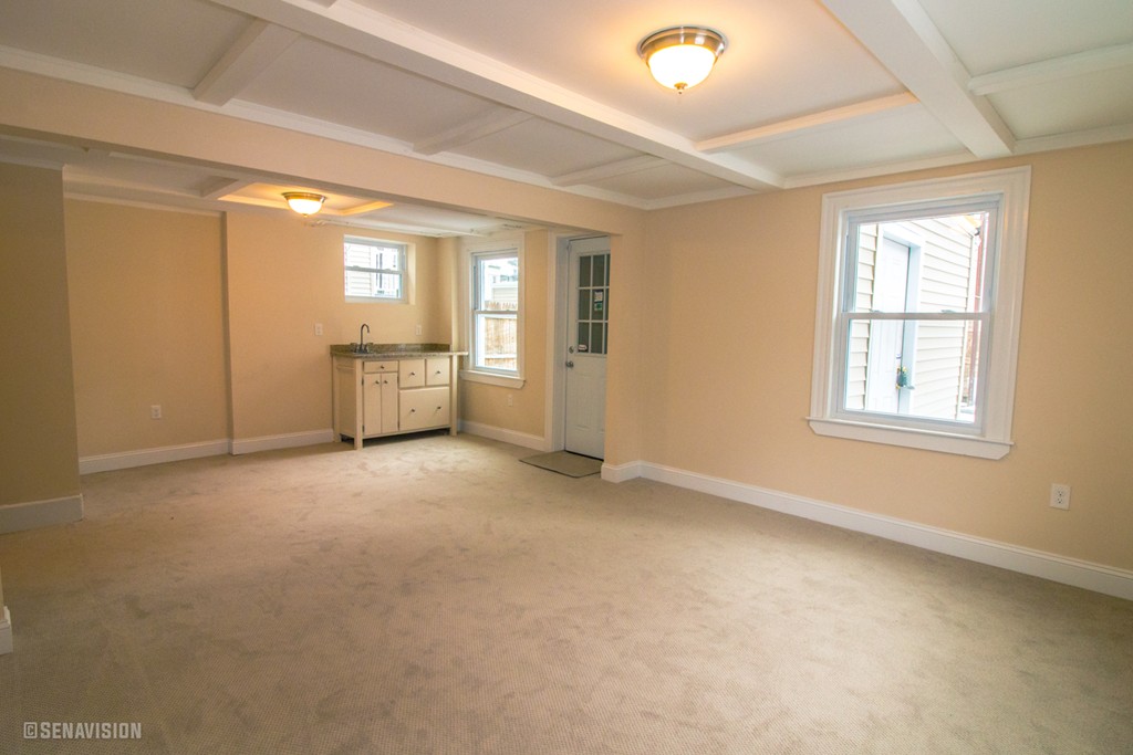 40 Humphreys Street Boston, MA 02125 - Photo 9 of 13 a view of an empty room with a window