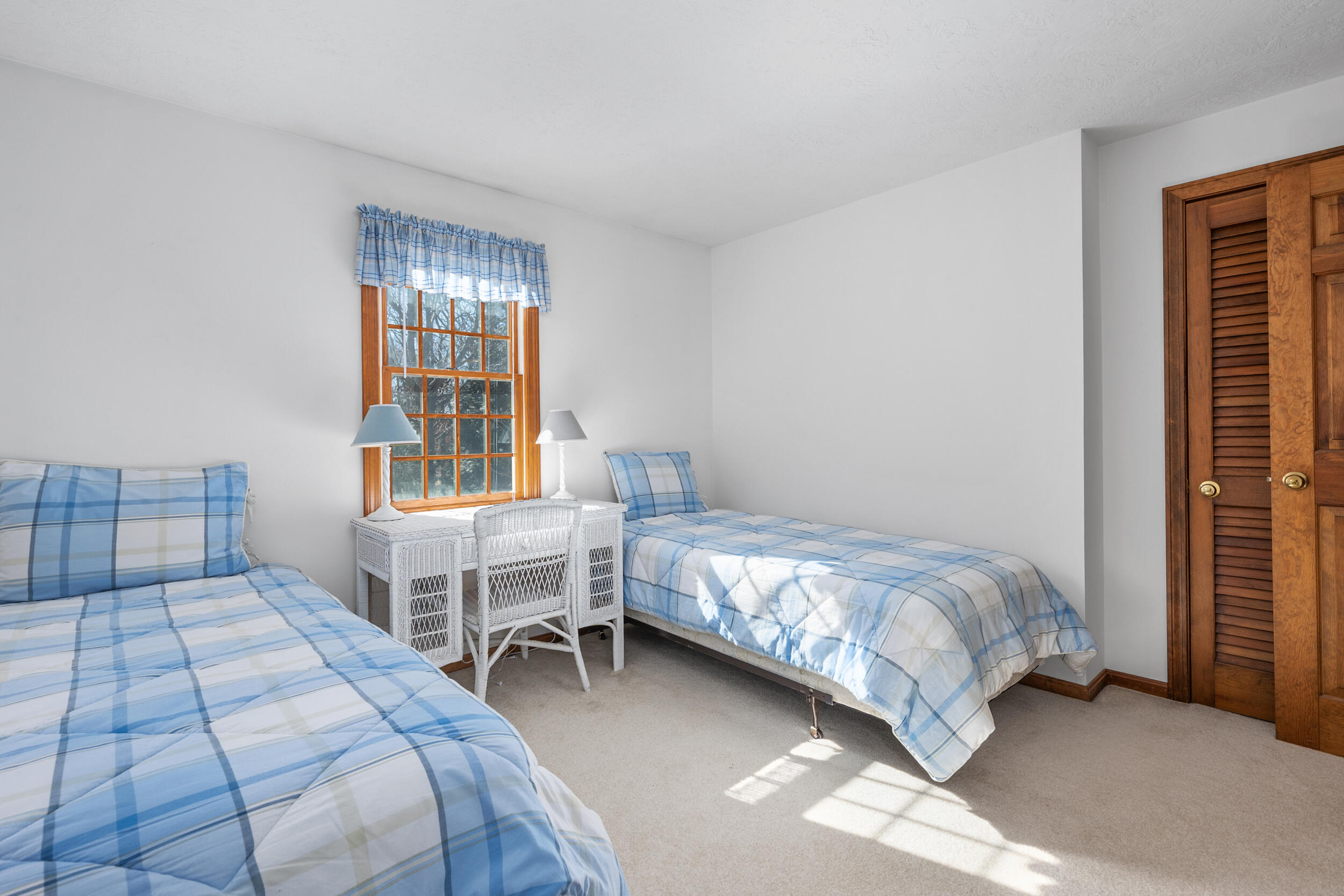4 Ralyn Road Cotuit, MA 02635 - Photo 25 of 53 a bedroom with a bed and a window