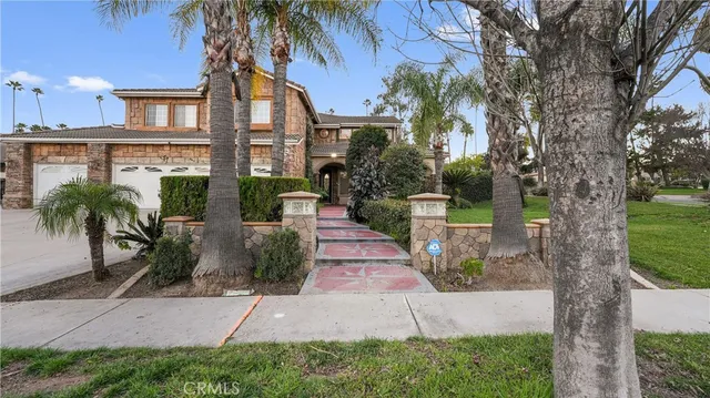 a view of a livingroom with furniture and staircase