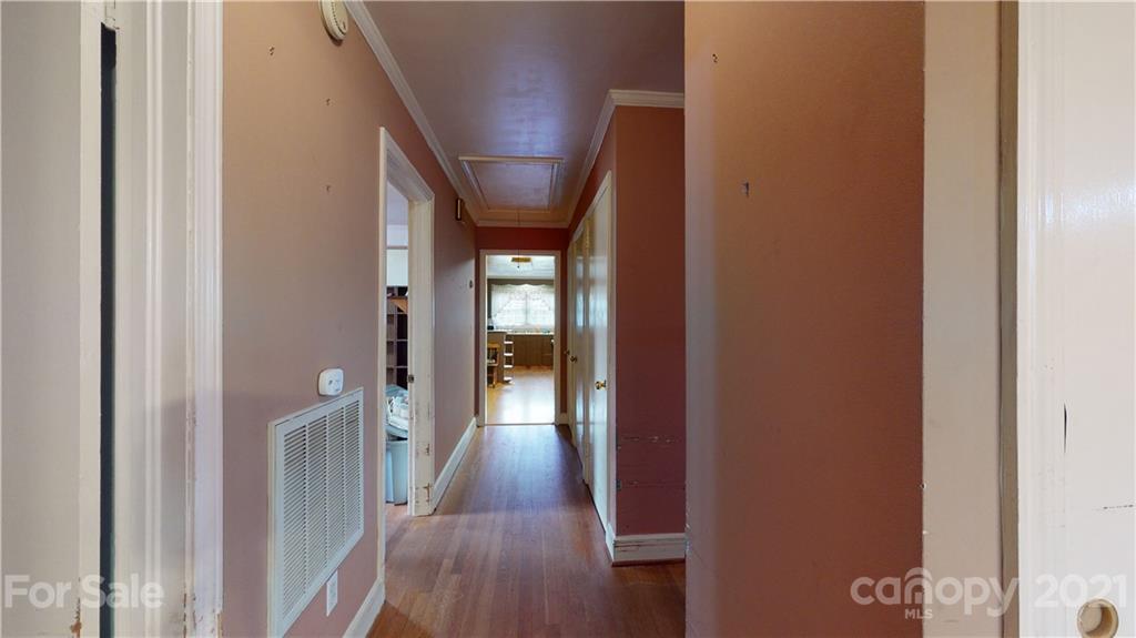 1565 Springlake Road York, SC 29745 - Photo 12 of 18 a view of a hallway with wooden floor