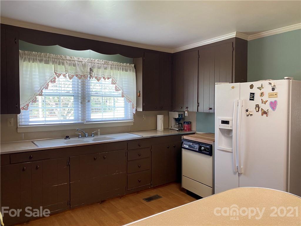1565 Springlake Road York, SC 29745 - Photo 5 of 18 a kitchen with a refrigerator a sink and dishwasher