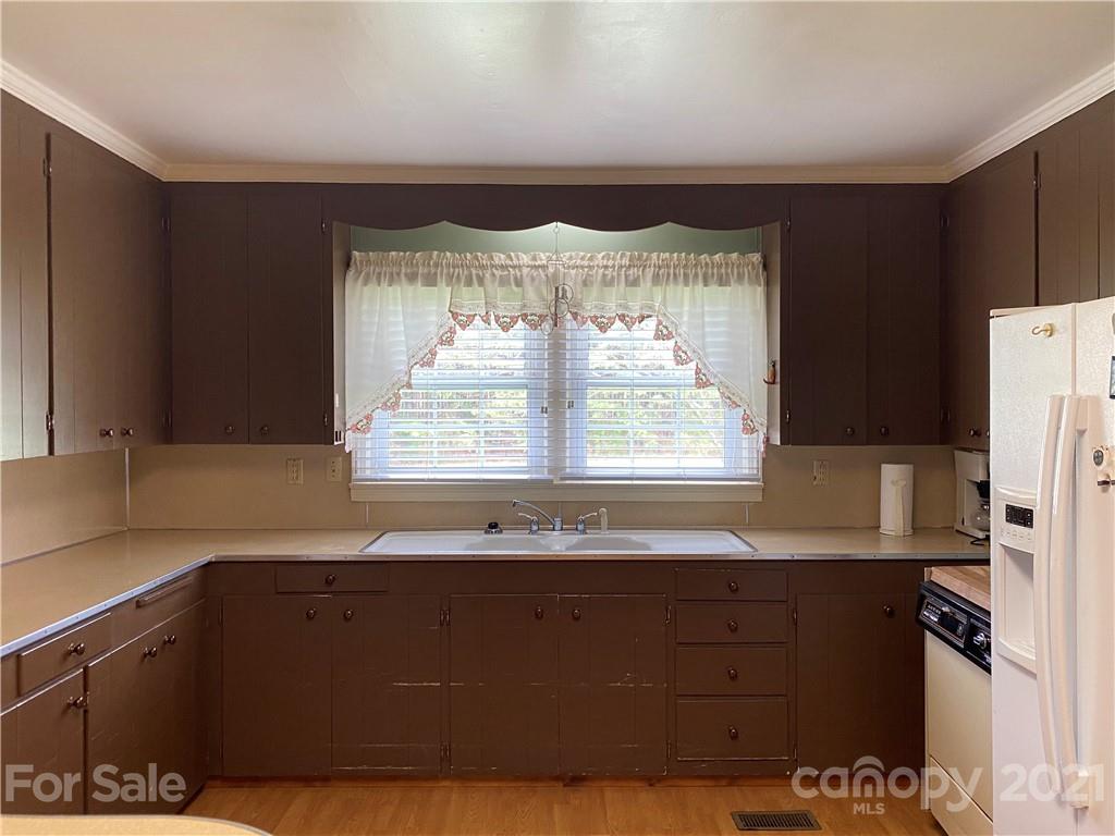 1565 Springlake Road York, SC 29745 - Photo 7 of 18 a bathroom with a sink and a large mirror