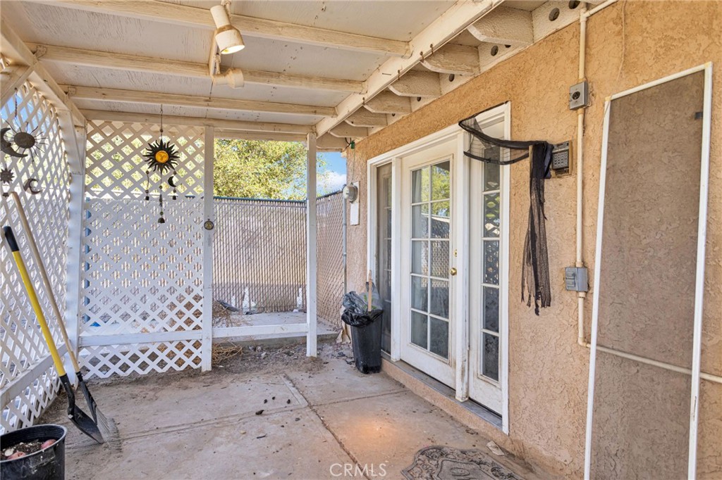 25488 Jade Road Barstow, CA 92311 - Photo 21 of 25 a view of entryway with stairs
