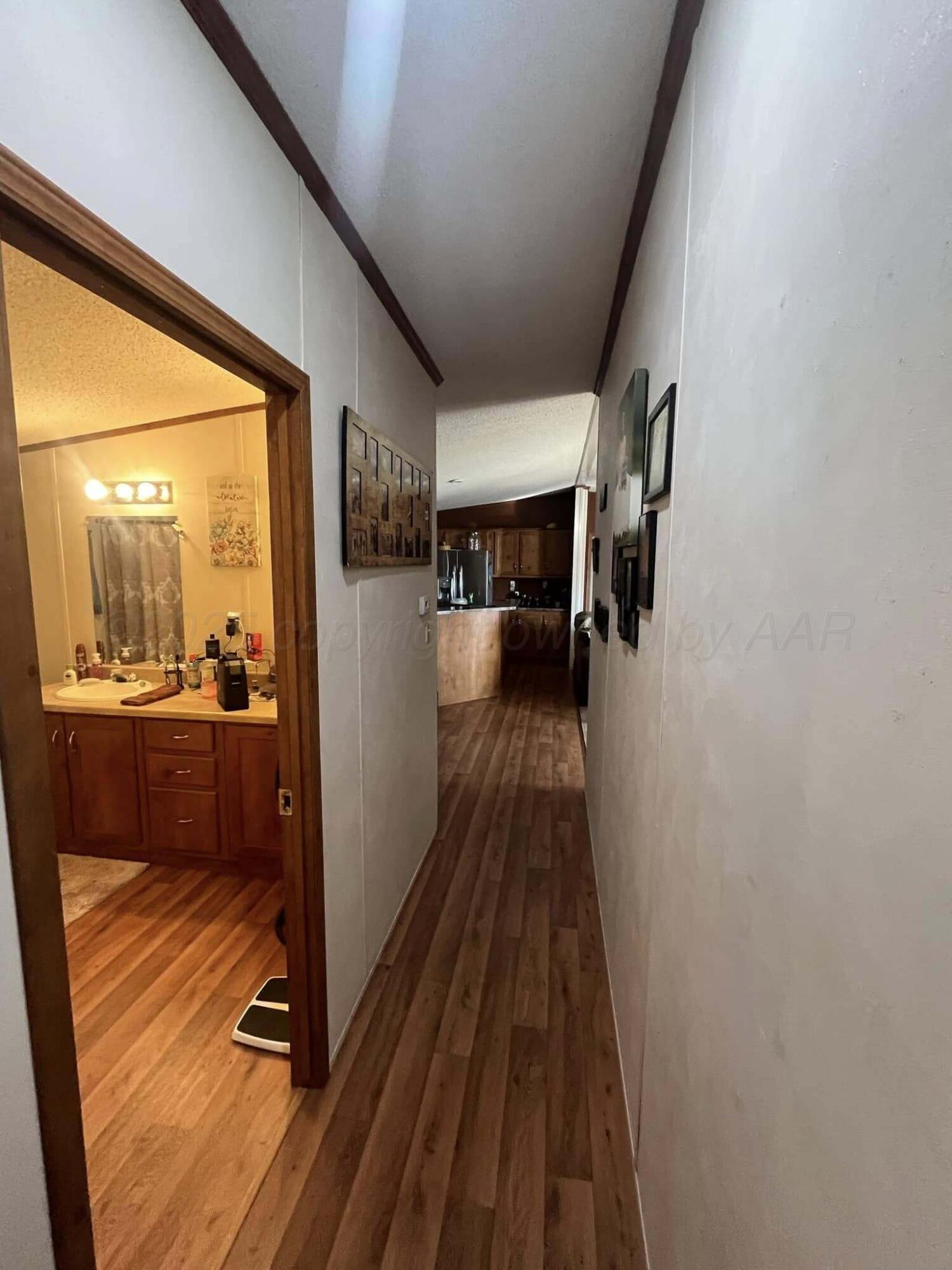 7101 Coyote Trail Amarillo, TX 79124 - Photo 12 of 14 a view of a living room with a fireplace