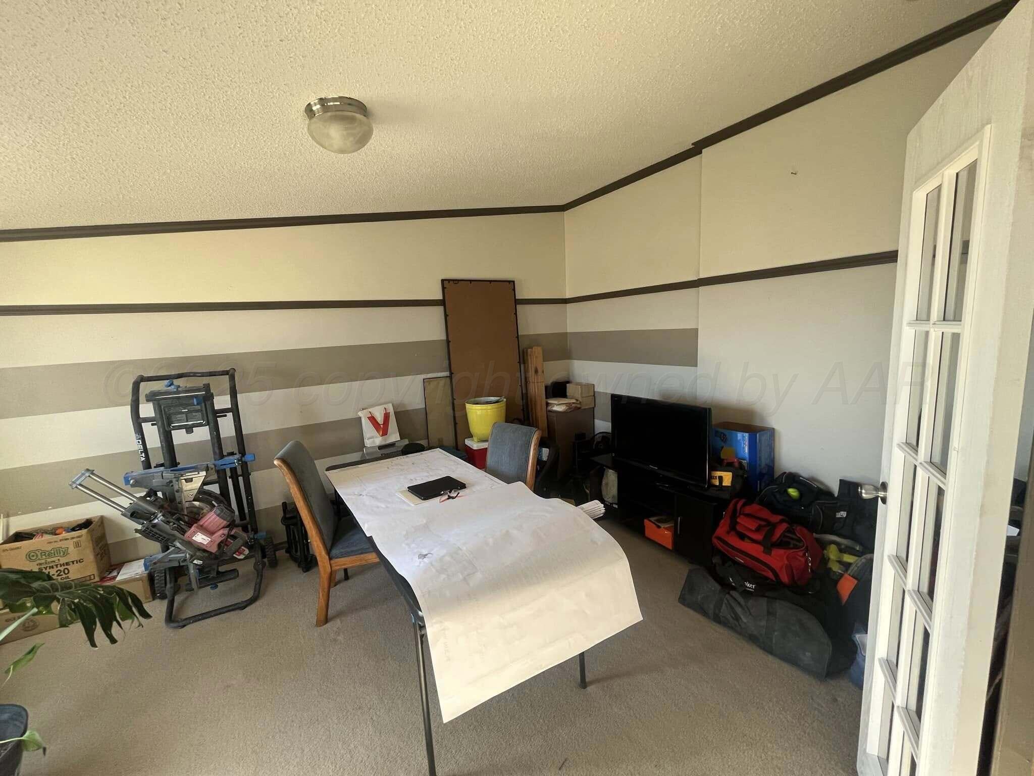 7101 Coyote Trail Amarillo, TX 79124 - Photo 6 of 14 a room with storage and utility