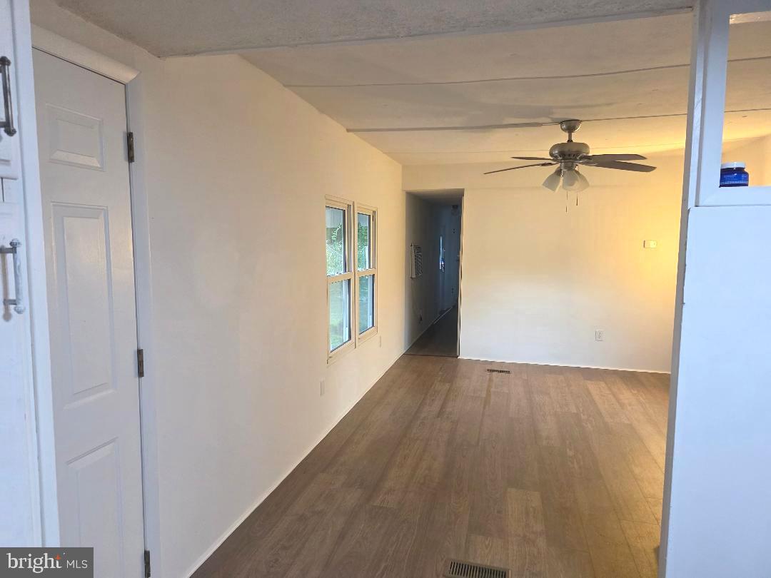 1762 Crown Point Road, Unit 2310B West Deptford, NJ 08086 - Photo 22 of 39 a view of a room with a window and a ceiling fan