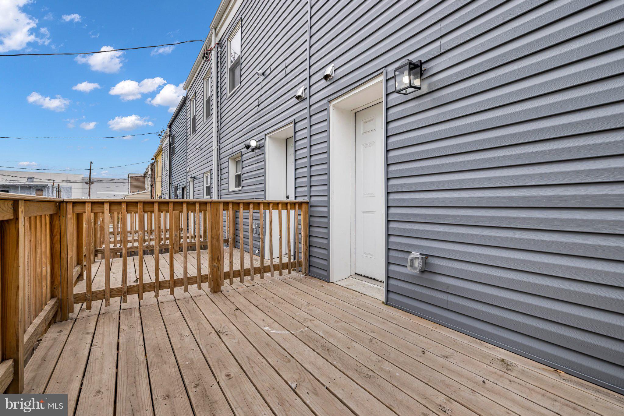 1622 Hazel Street Baltimore, MD 21226 - Photo 9 of 40 Sunny deck with modern siding charm.