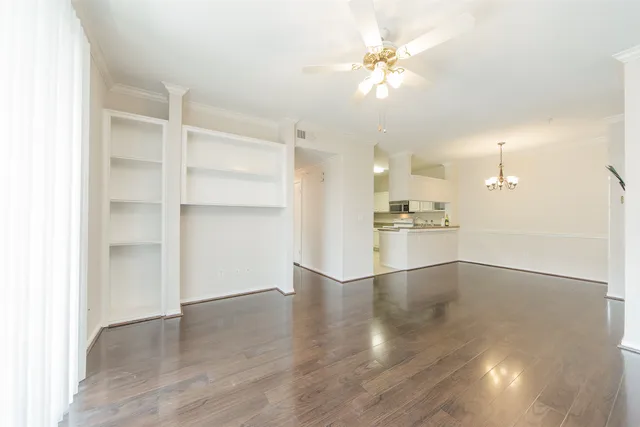 a view of a kitchen with a sink and a kitchen view