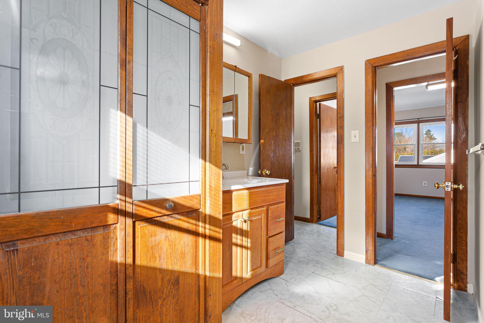 2623 Knights Road Bensalem, PA 19020 - Photo 41 of 50 a view of a bathroom with sink and mirror
