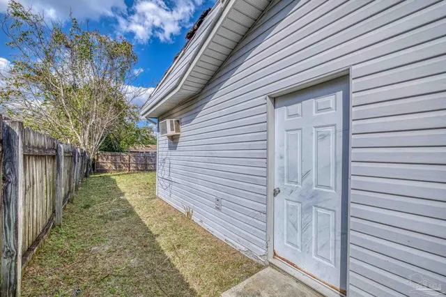 a view of a pathway with a backyard
