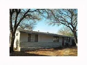 a black and white photo of a house