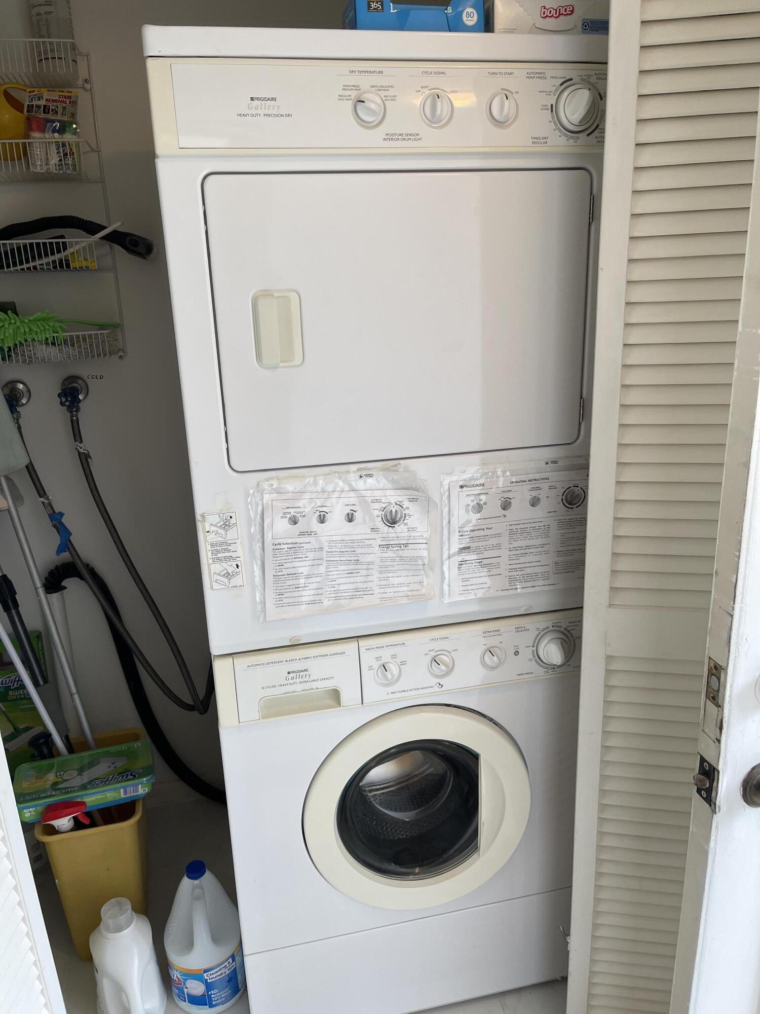 4291 Northwest 9th Avenue, Unit 104 Deerfield Beach, FL 33064 - Photo 7 of 11 a utility room with dryer and washer