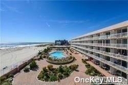 830 Shore Road, Unit 5I Long Beach, NY 11561 - Photo 1 of 1 a view of a ocean with a building