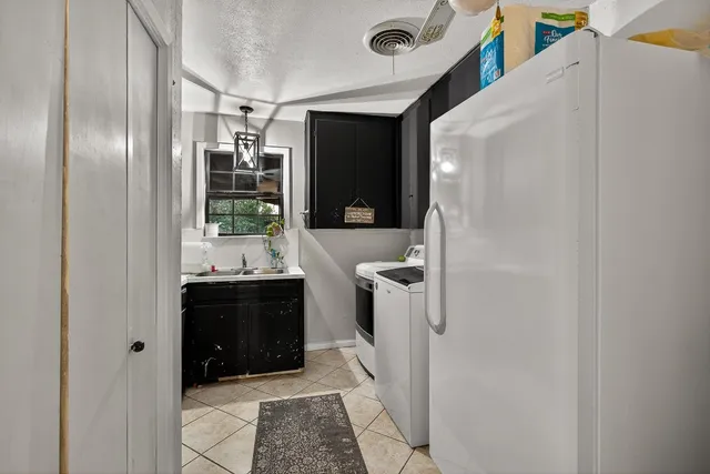 a bathroom with a sink and mirror