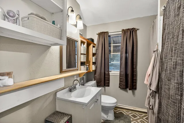 a bed room with a bed and a walk in closet