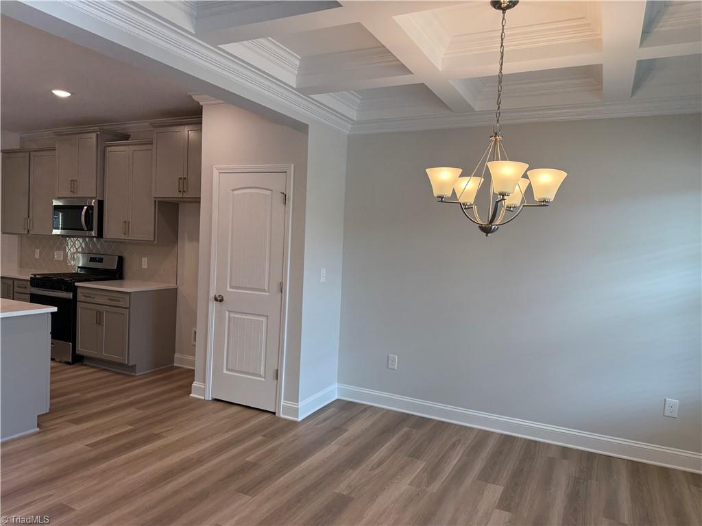 3301 Alyssa Way High Point, NC 27265 - Photo 24 of 43 Coffered ceiling in dining room