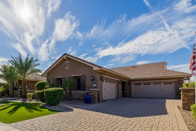 a bathroom with a shower sink and mirror