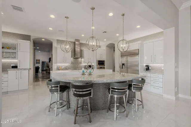 a view of a swimming pool with a patio