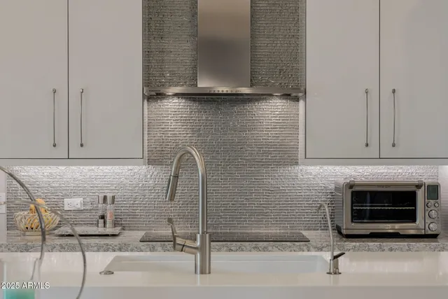 a dining room with furniture and garden view