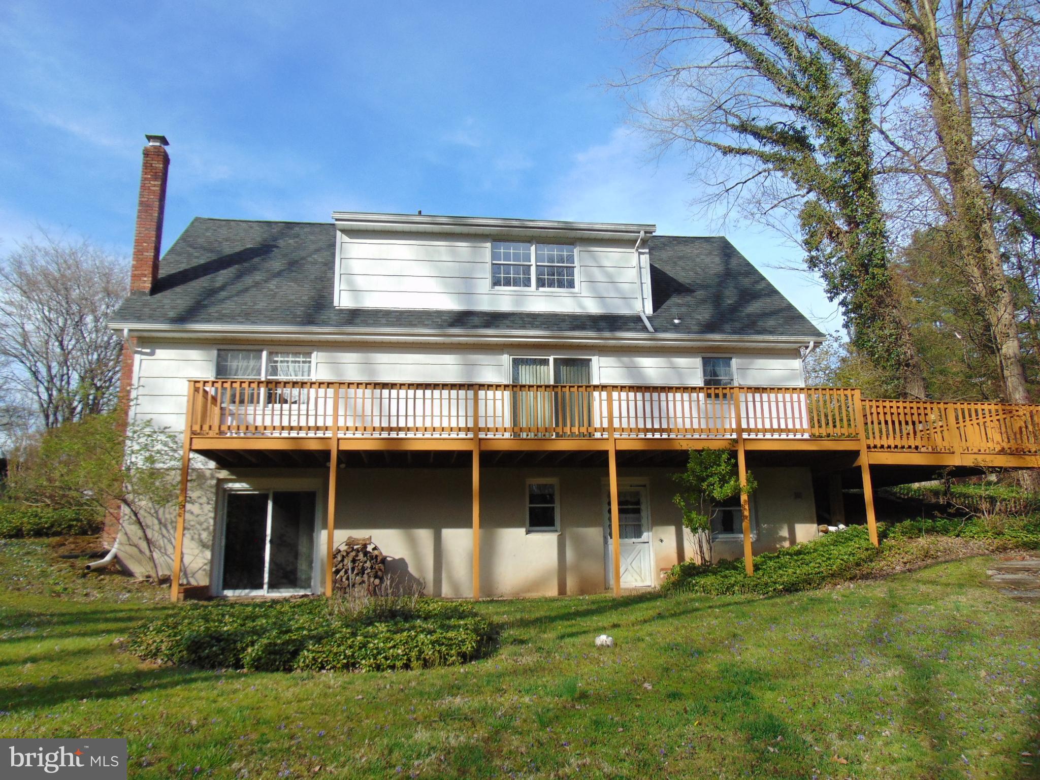 1102 Mill Creek Road Fallston, MD 21047 - Photo 3 of 28 a front view of a house with a yard