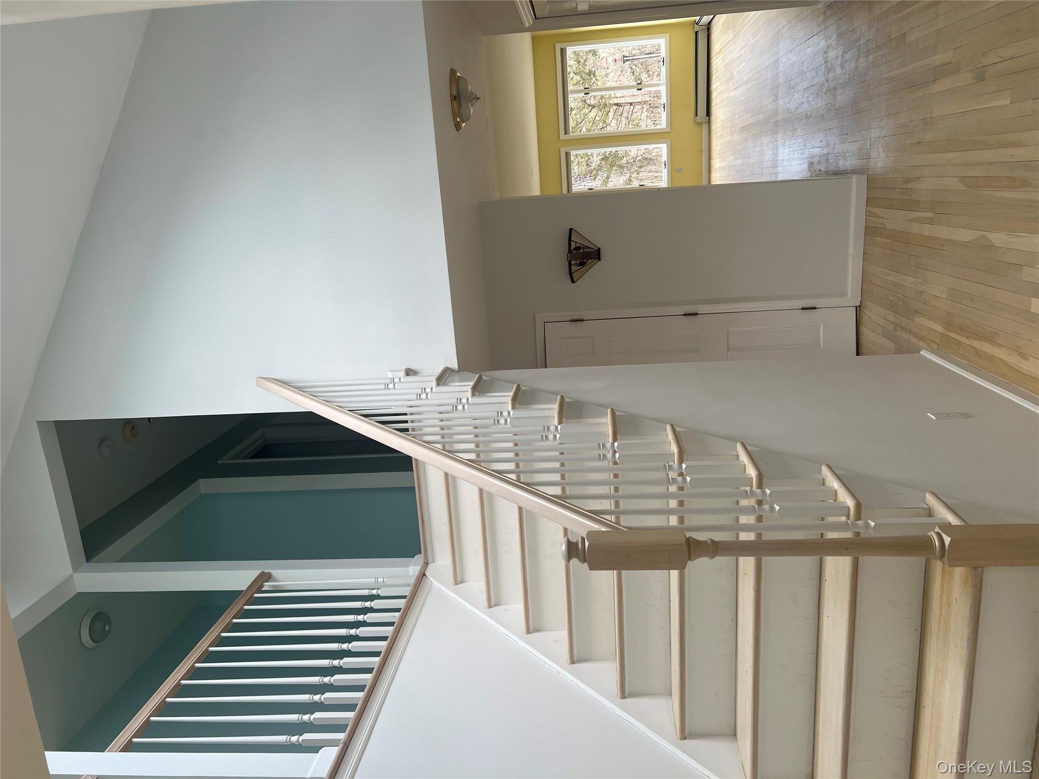 50 Downey Lane Cold Spring, NY 10516 - Photo 8 of 24 Entry with coat closet and stairs to upper level