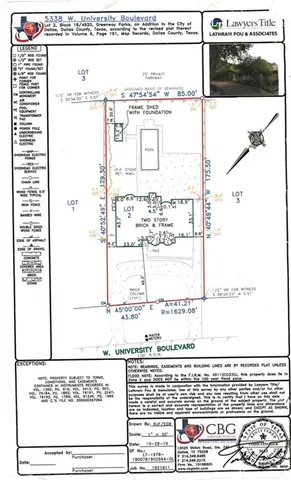 a front view of a house with parking space