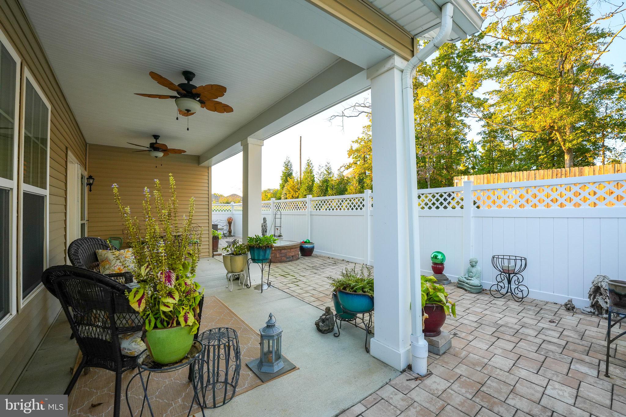 12426 Ruby Red Drive Fredericksburg, VA 22407 - Photo 31 of 46 Extended Living Space Outside Under Covered Patio
