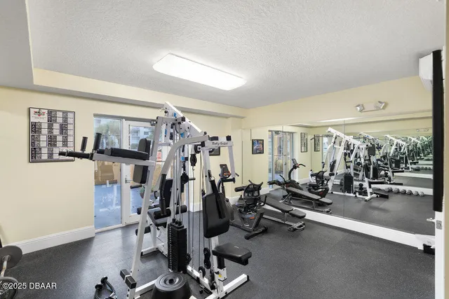 a view of a room with gym equipment
