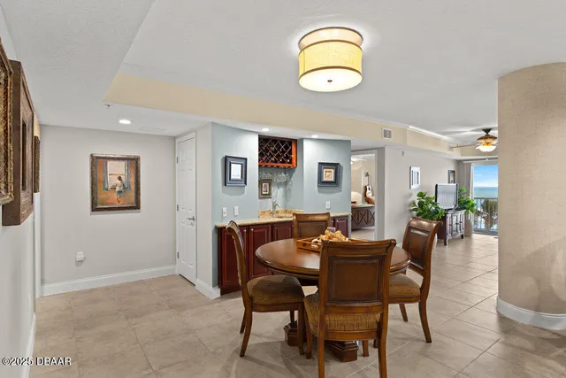 a view of a dining room with furniture