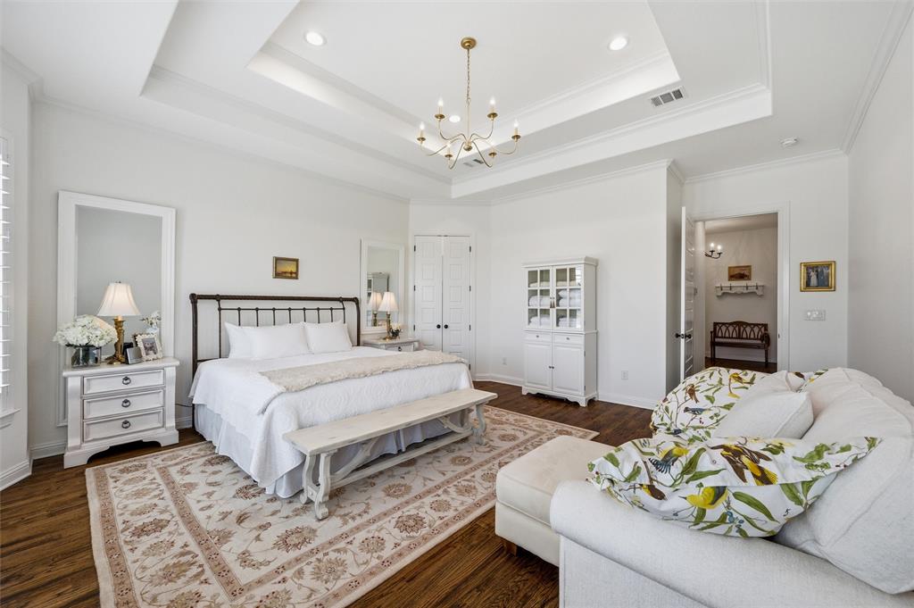 318 Arapahoe Ridge Weatherford, TX 76087 - Photo 17 of 40 Primary bedroom with tray ceiling