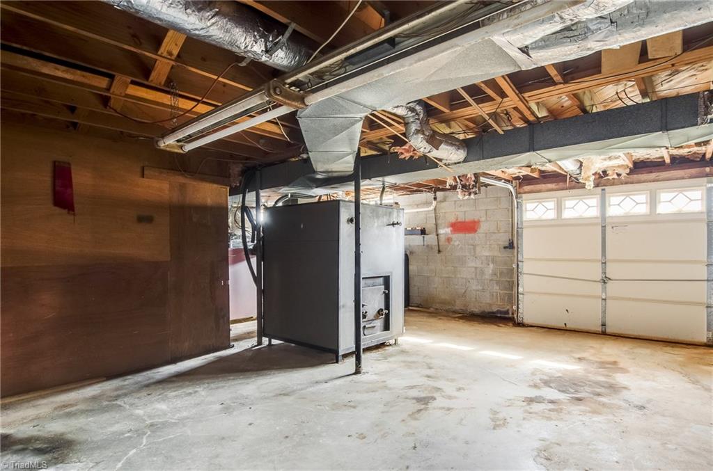 1610 Bunker Hill Sandy Ridge Road Kernersville, NC 27284 - Photo 19 of 27 Basement and lower level garage entry