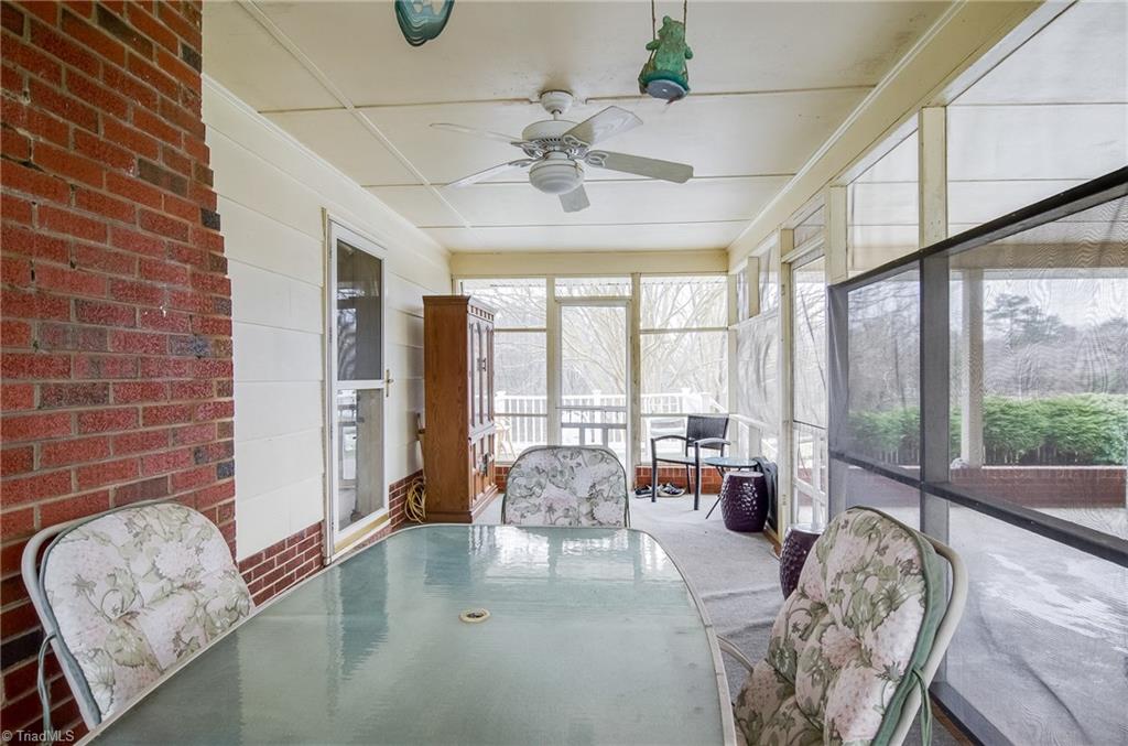 1610 Bunker Hill Sandy Ridge Road Kernersville, NC 27284 - Photo 3 of 27 Screened porch off carport