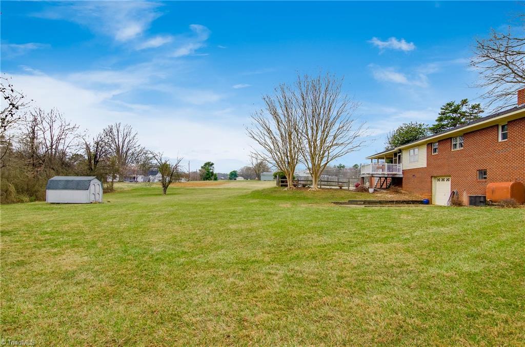 1610 Bunker Hill Sandy Ridge Road Kernersville, NC 27284 - Photo 23 of 27 Back yard - building conveys with property