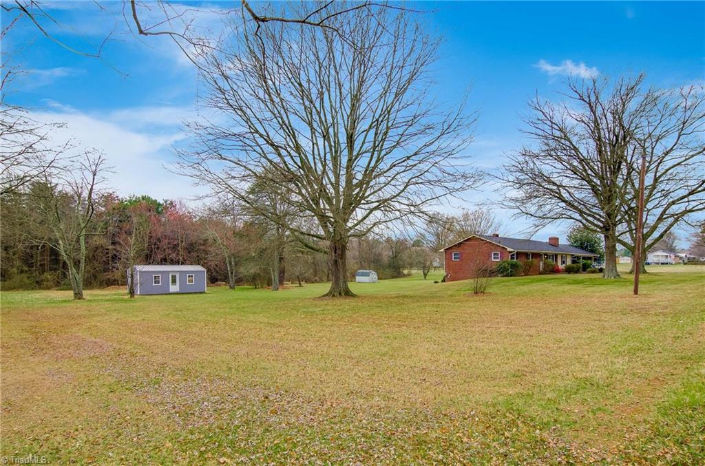 1610 Bunker Hill Sandy Ridge Road Kernersville, NC 27284 - Photo 26 of 27 Additional side lot that conveys with property. Large building in picture does not convey.