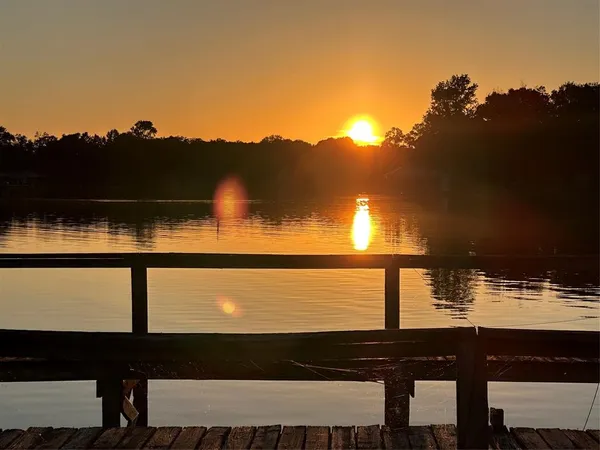a view of a lake from a balcony