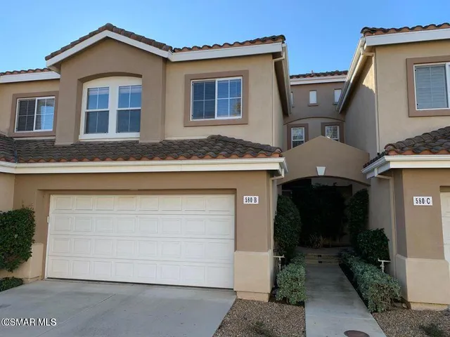 a front view of house with yard