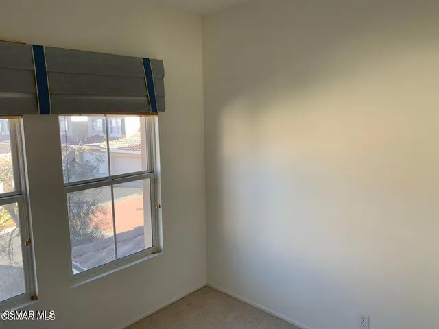 a bathroom with a sink a toilet and vanity