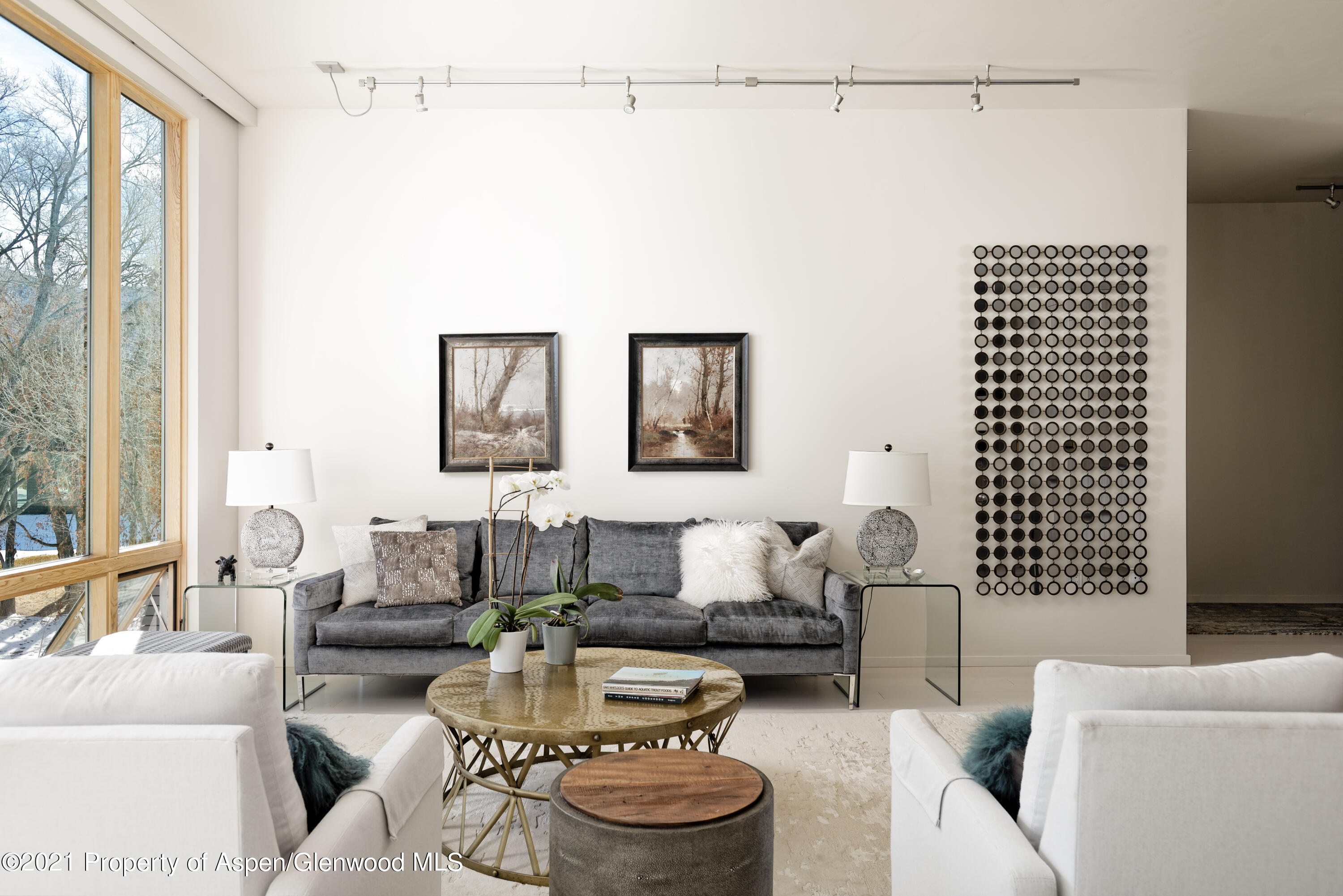 104 Evans Road, Unit 205 Basalt, CO 81621 - Photo 6 of 16 a living room with furniture and a window