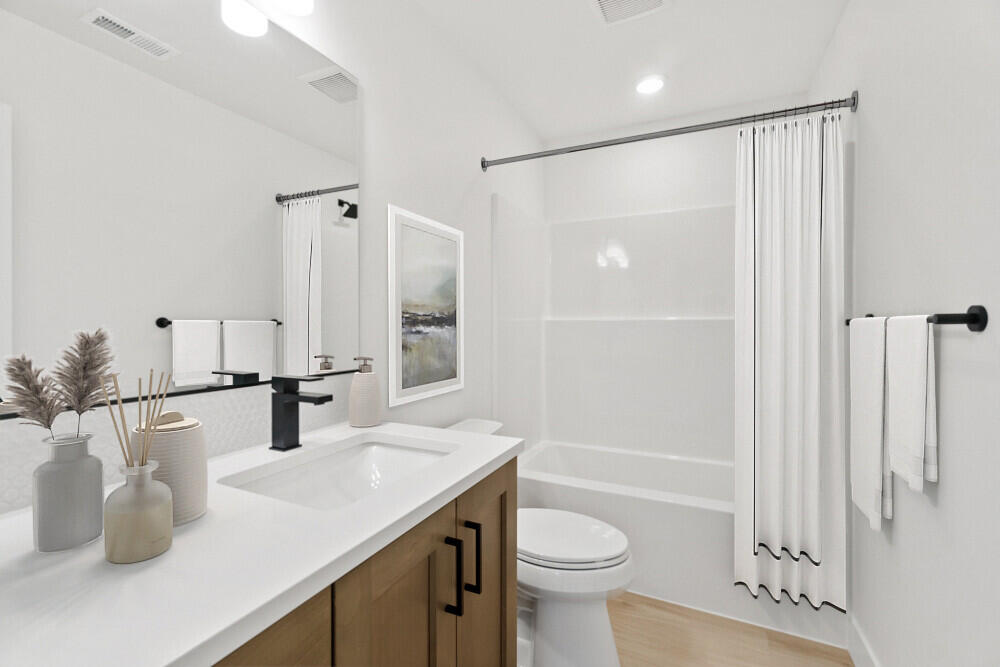 3843 Eagle Road Bend, OR 97701 - Photo 5 of 21 a bathroom with a double vanity sink toilet and shower
