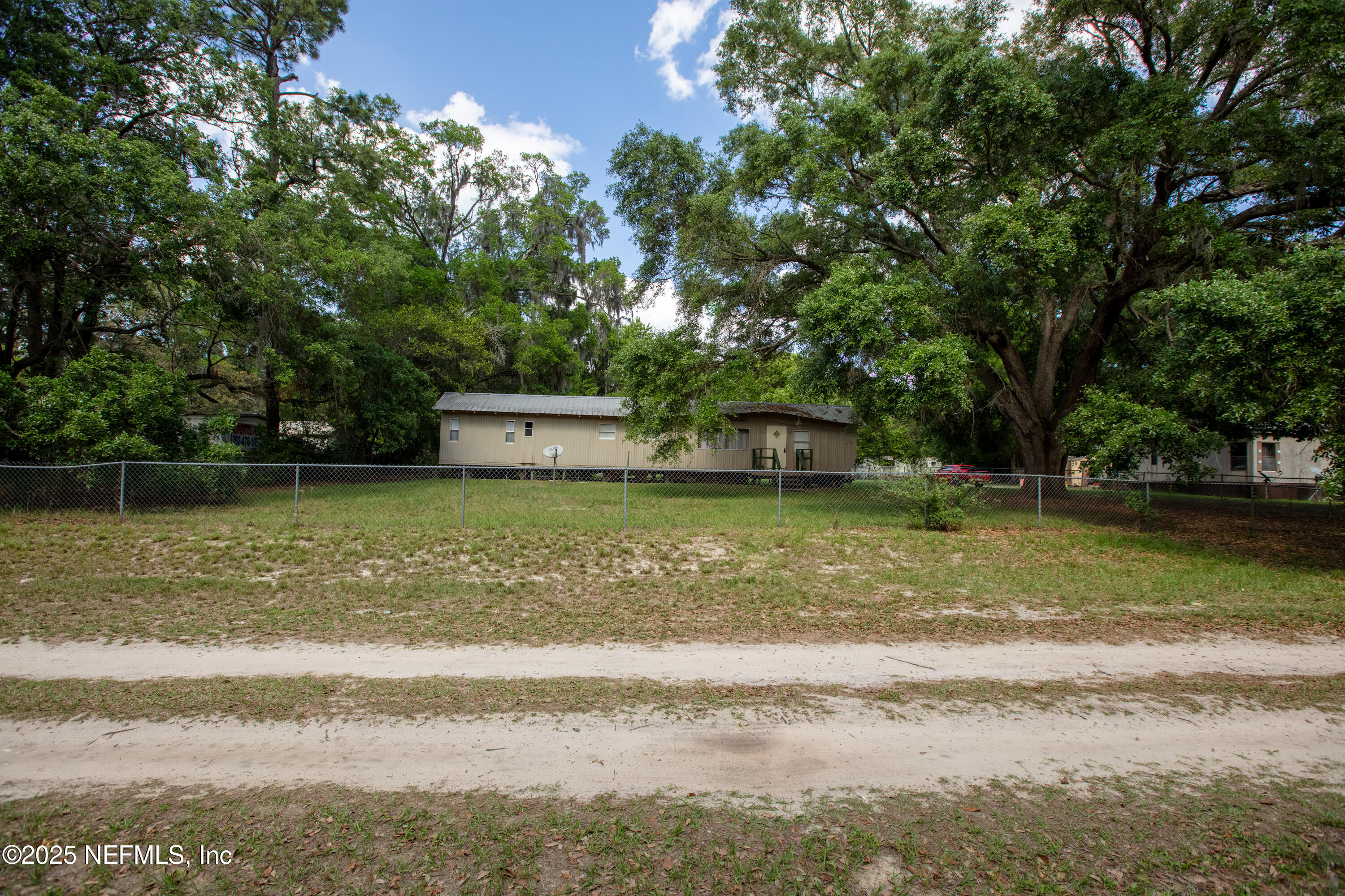 6398 Cascade Drive Keystone Heights, FL 32656 - Photo 1 of 31 a view of a house with a yard