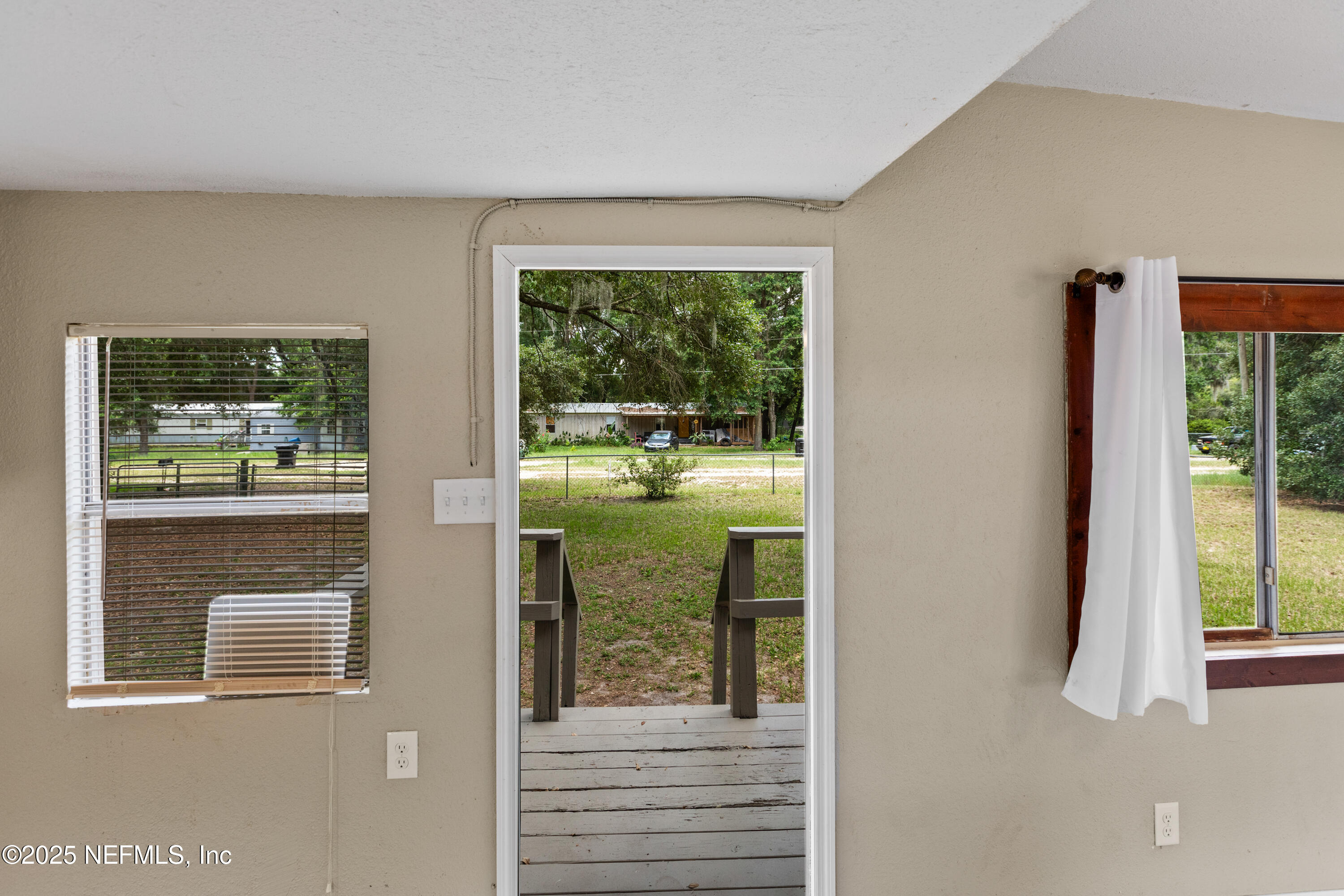 6398 Cascade Drive Keystone Heights, FL 32656 - Photo 14 of 31 a view of swimming pool from a window