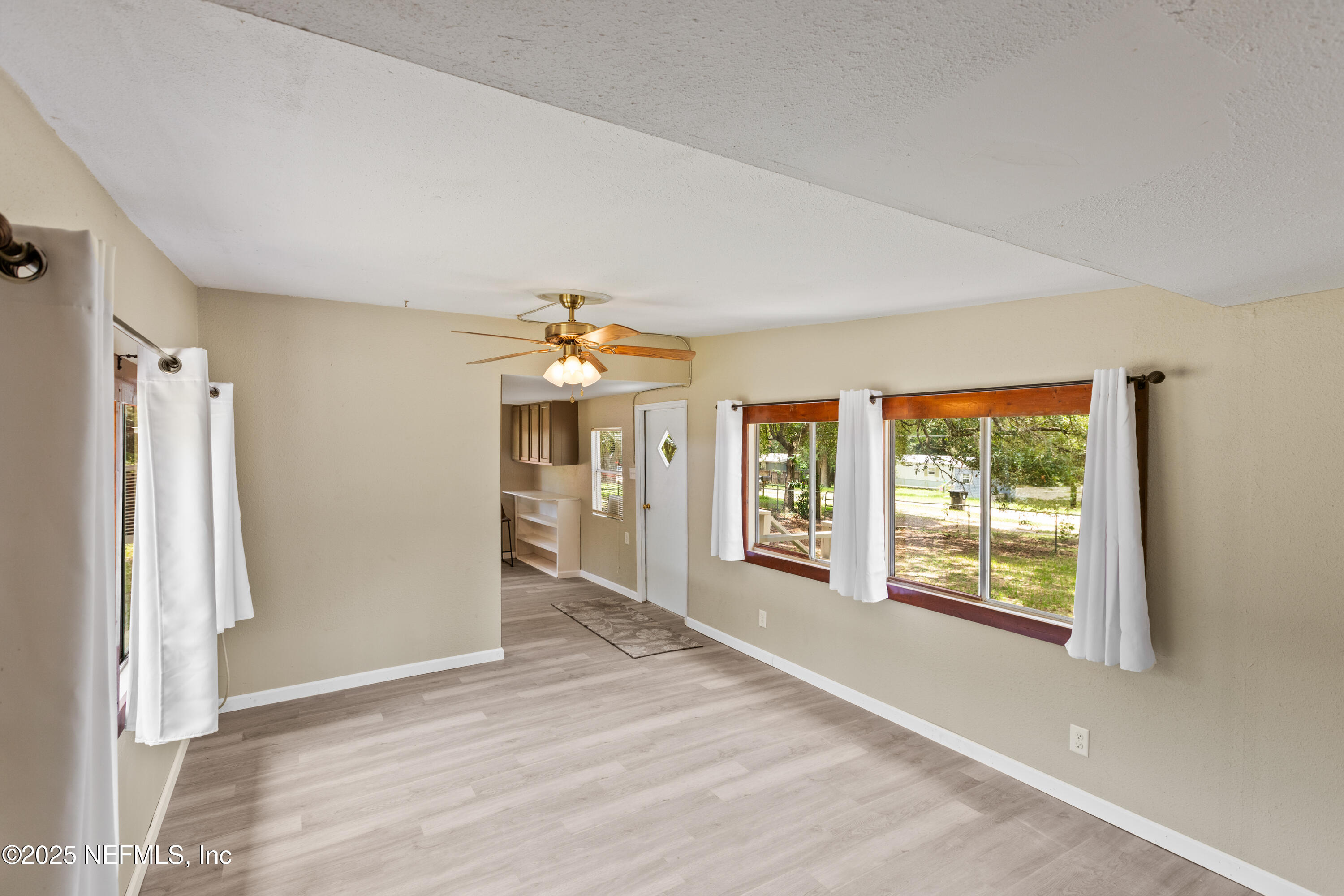 6398 Cascade Drive Keystone Heights, FL 32656 - Photo 21 of 31 a view of an empty room with a window