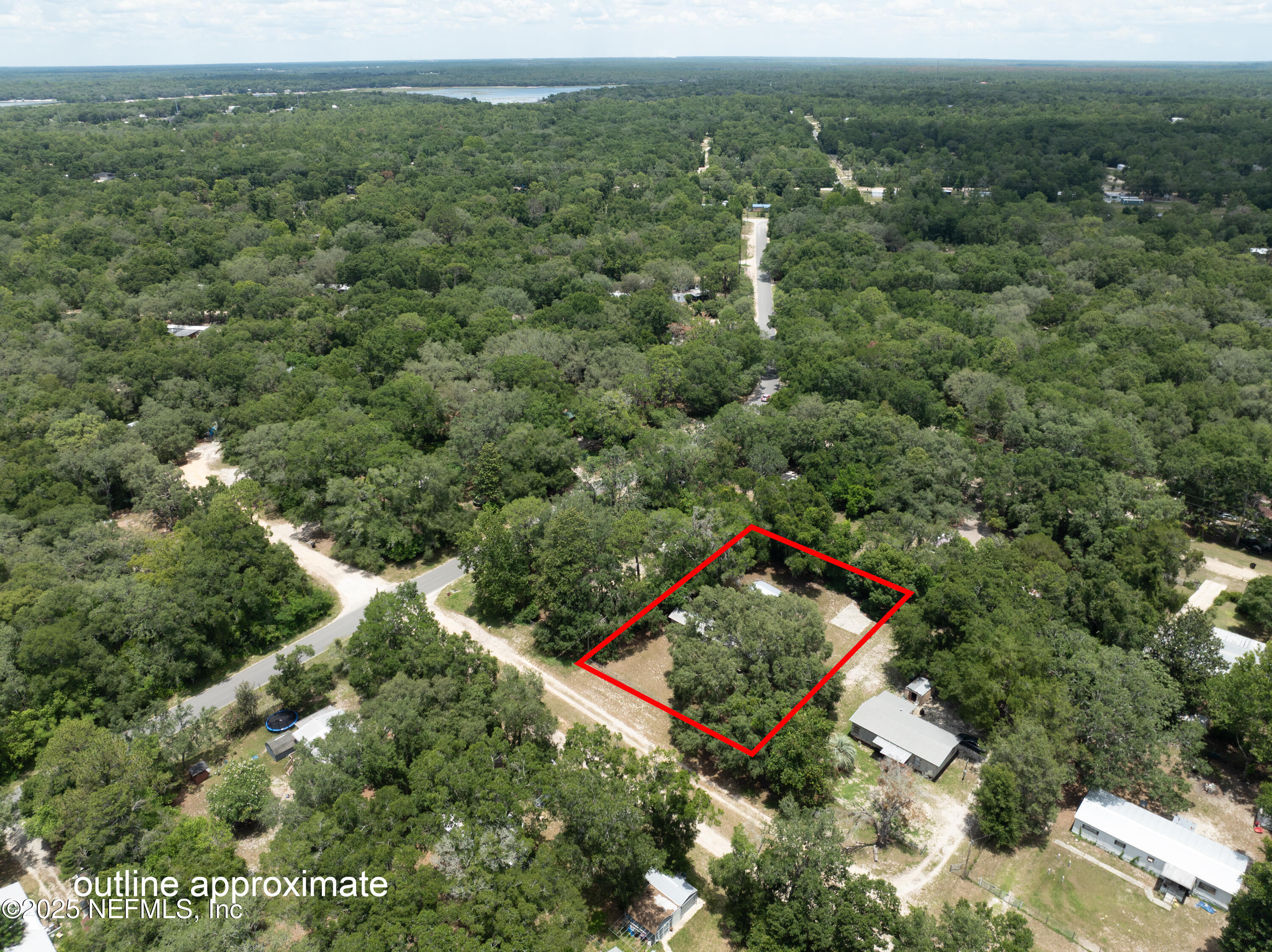 6398 Cascade Drive Keystone Heights, FL 32656 - Photo 31 of 31 an aerial view of a house with a yard