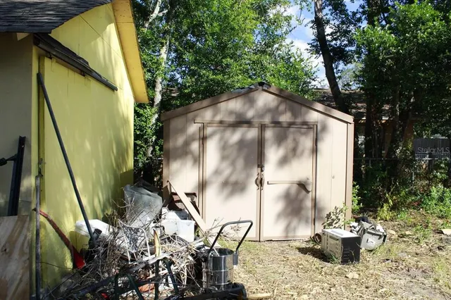 a backyard of a house with lots of green space