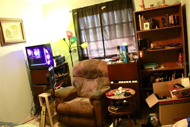 a living room with furniture and a couch