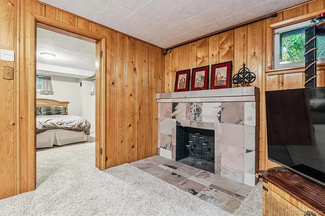 a bathroom with a sink a mirror and shower