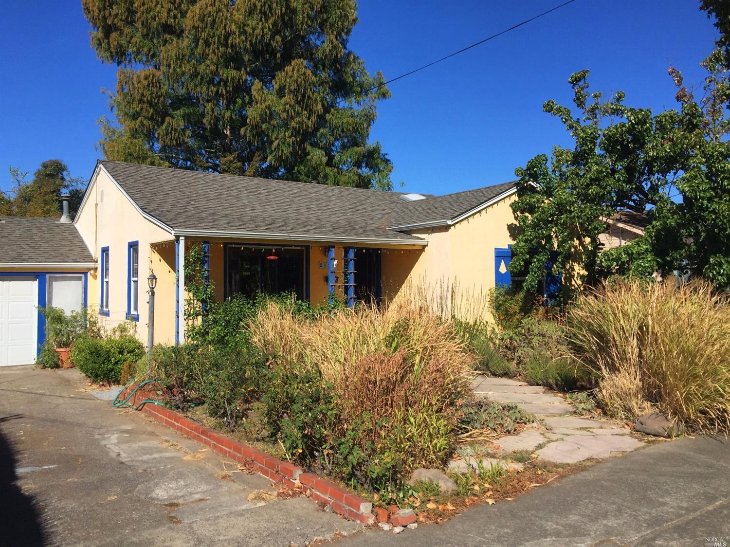 2125 Orchard Street Santa Rosa, CA 95404 - Photo 1 of 1 a front view of a house with garden