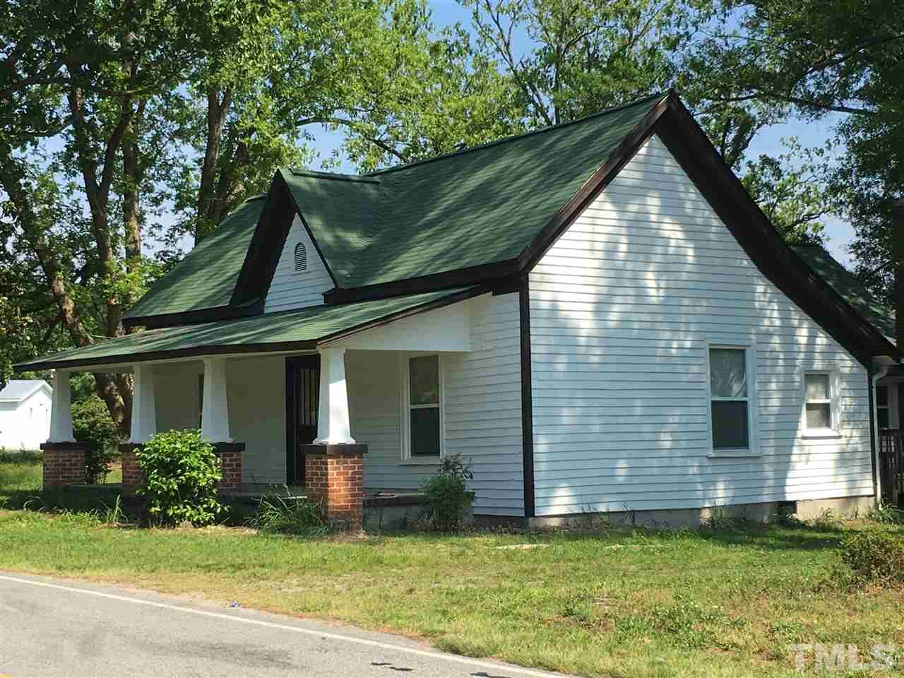 804 Pine Ridge Road Zebulon, NC 27597 - Photo 3 of 12 a view of a house with a yard